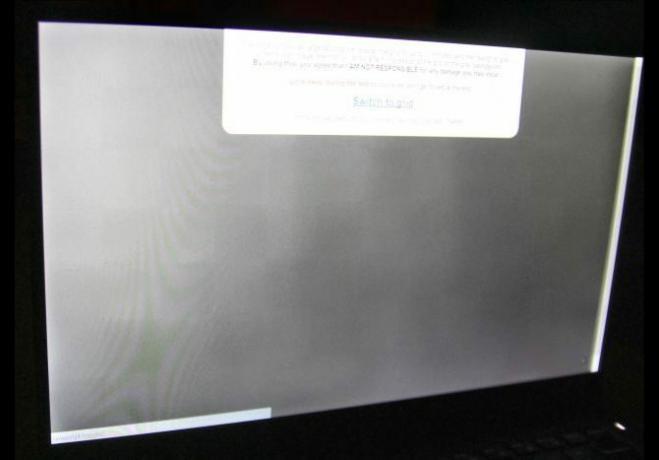 זוהי תמונה של Dell XPS 13 עם בעיות שמירת תמונות הדומות לשריפת המסך של OLED